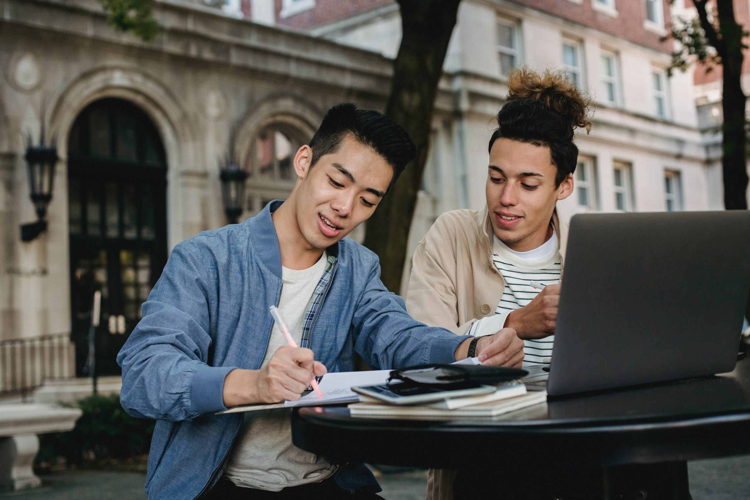 Two people studying at a table